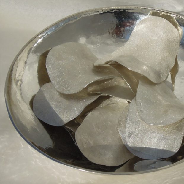 Closeup of silver crisp bowl